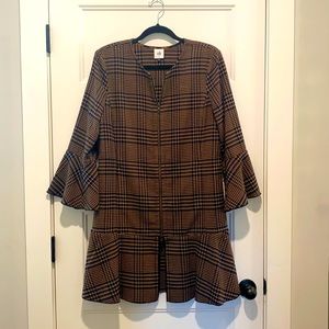 Cabi zip front jacket with flounce detail on sleeves & hem.